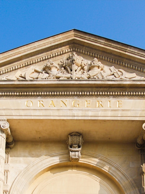 Orangerie Museum entrance with classical columns and detailed pediment in Paris.