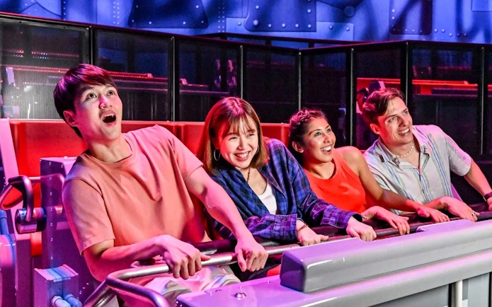 Visitors enjoying a thrilling ride at Universal Studios Singapore.