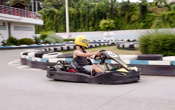 Person driving a go-kart at Outdoor Karting, Bali Hai Pier, Pattaya.