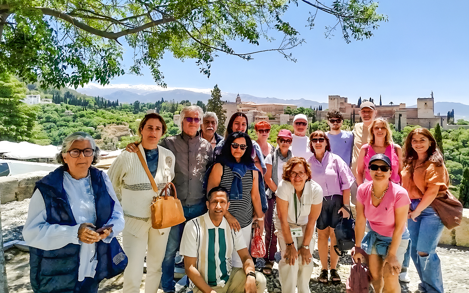 Group of tourists on a guided tour near the Alhambra in Granada, Spain.