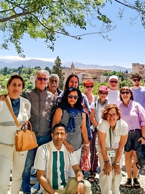 Group of tourists on a guided tour near the Alhambra in Granada, Spain.