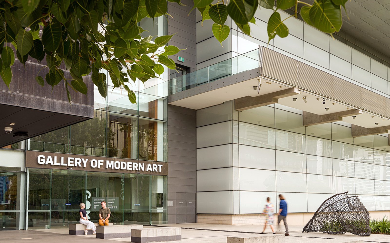 Gallery of Modern Art entrance with visitors and outdoor sculpture, Brisbane.
