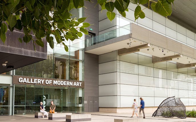 Gallery of Modern Art entrance with visitors and outdoor sculpture, Brisbane.