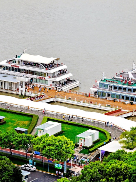 Aerial view of cruise ships docked near Oriental Pearl Tower, Shanghai.