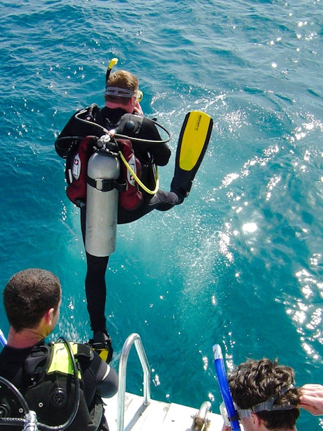 Scuba divers jumping into the Red Sea for a dive, Hurghada.