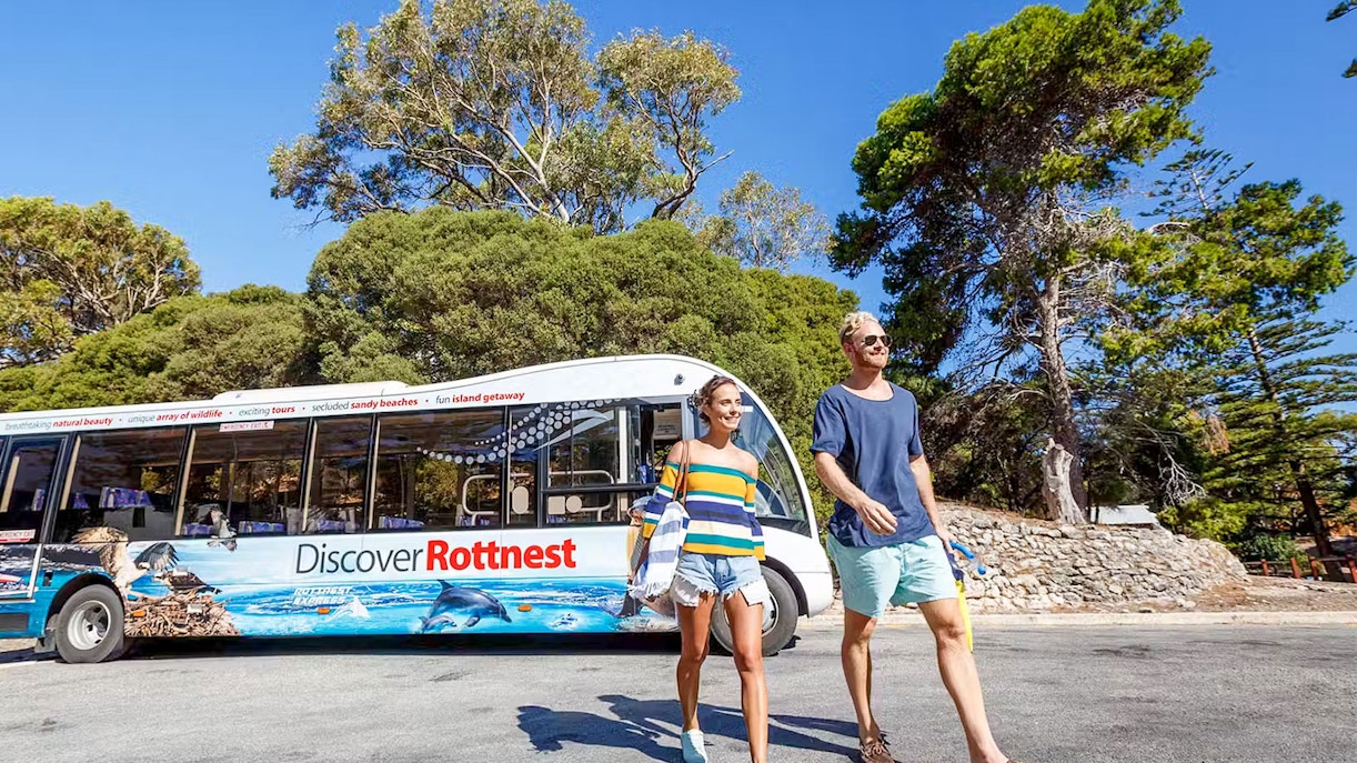 Rottnest Island bus tour with scenic coastal view, Western Australia.