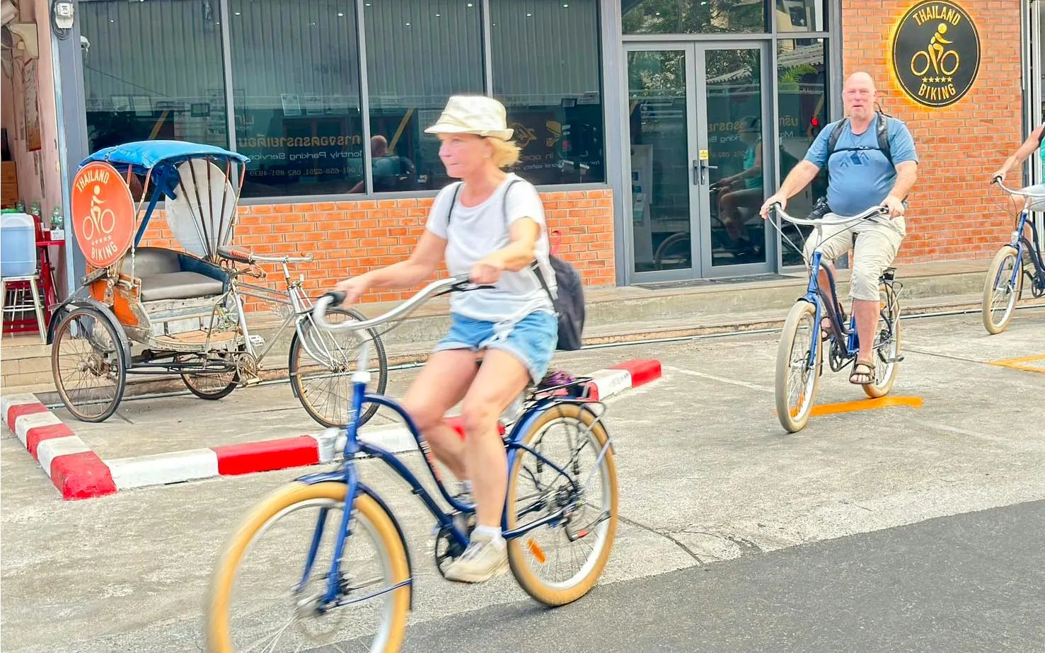 Cyclists exploring Bangkok's Green Lung area on a guided bike tour.