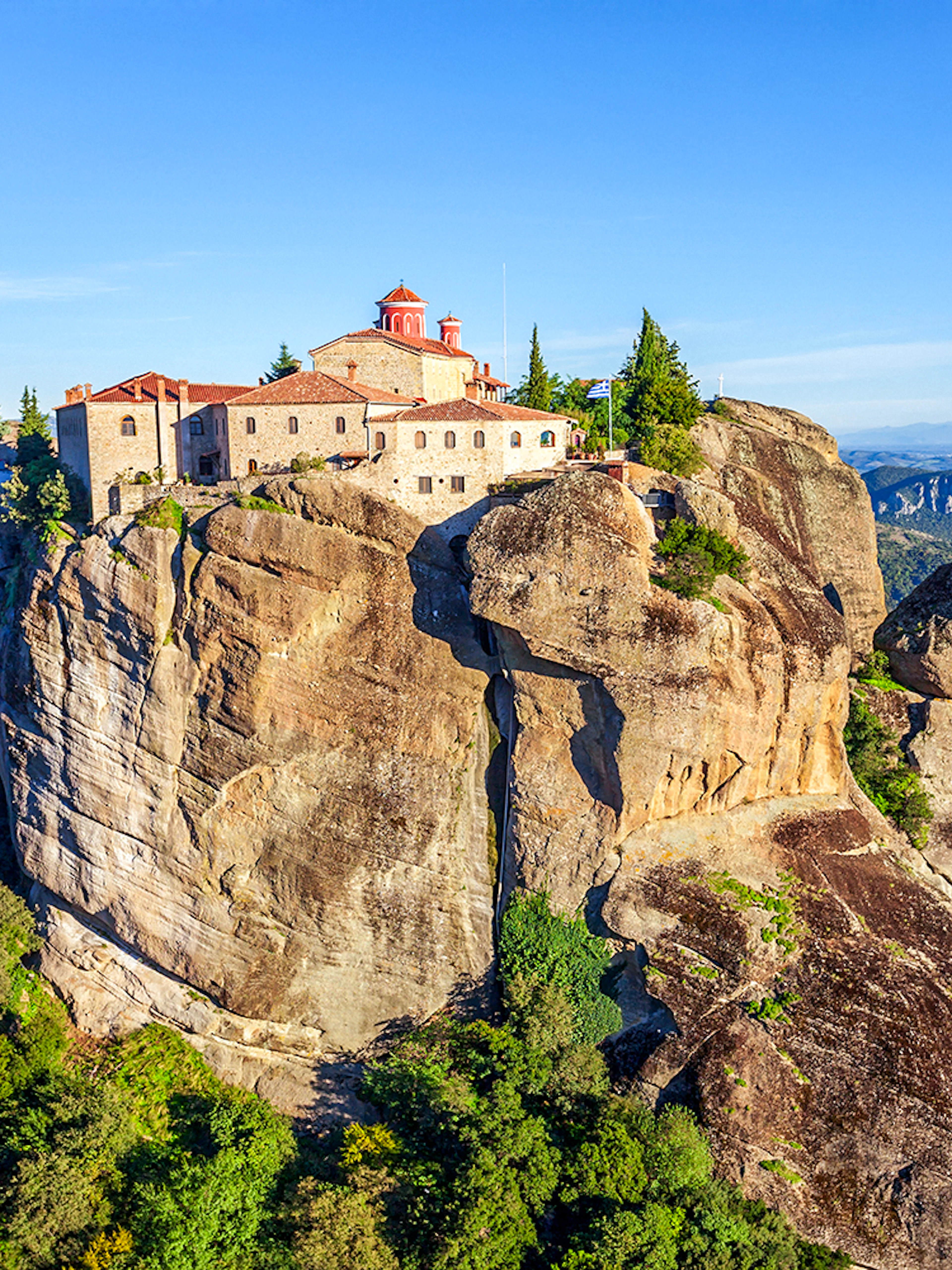 Saint Stephen Holy Monastery perched on a cliff in Meteora, Greece.