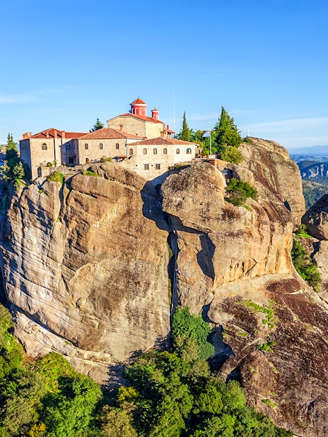 Saint Stephen Holy Monastery perched on a cliff in Meteora, Greece.