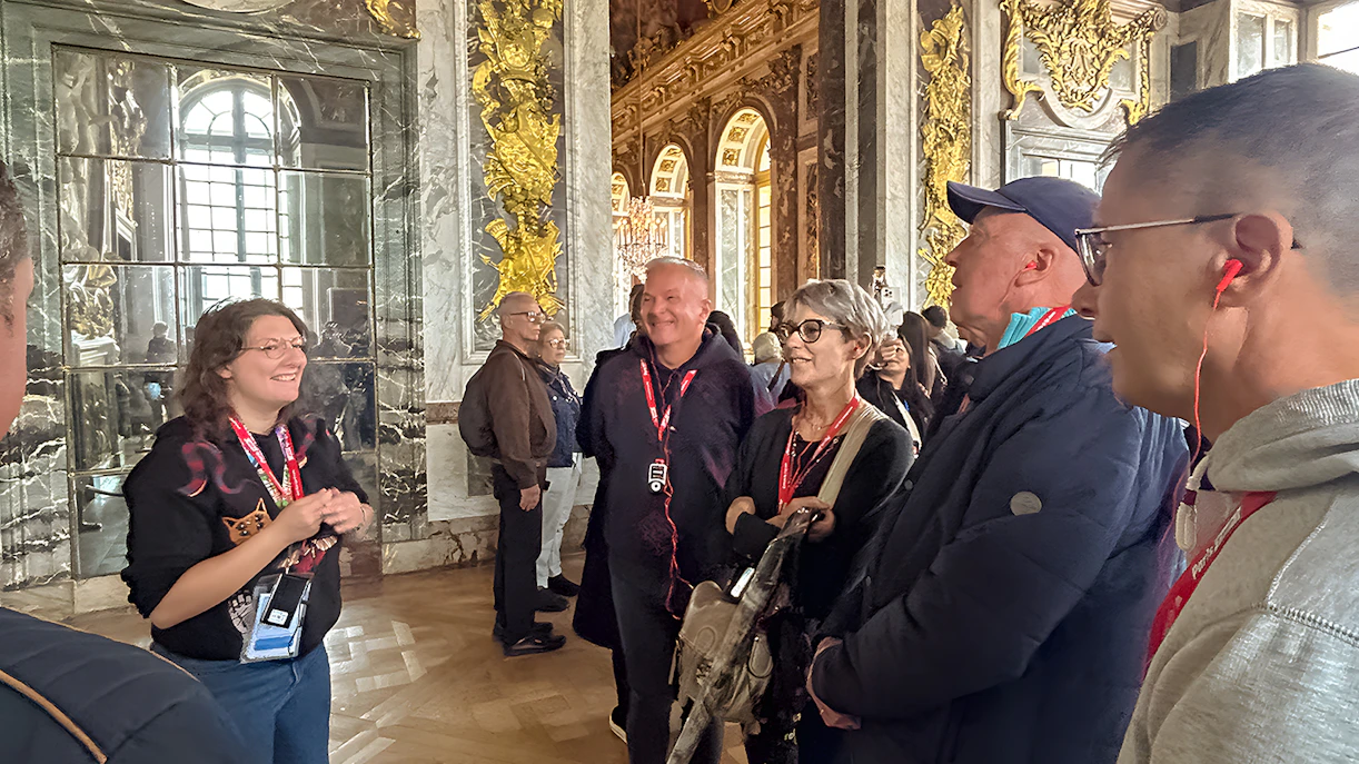 Tour group in the King's Private Apartments at Palace of Versailles, France.
