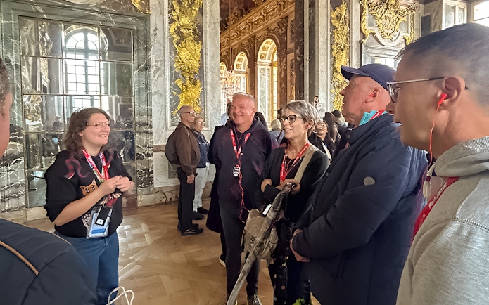 Tour group in the King's Private Apartments at Palace of Versailles, France.