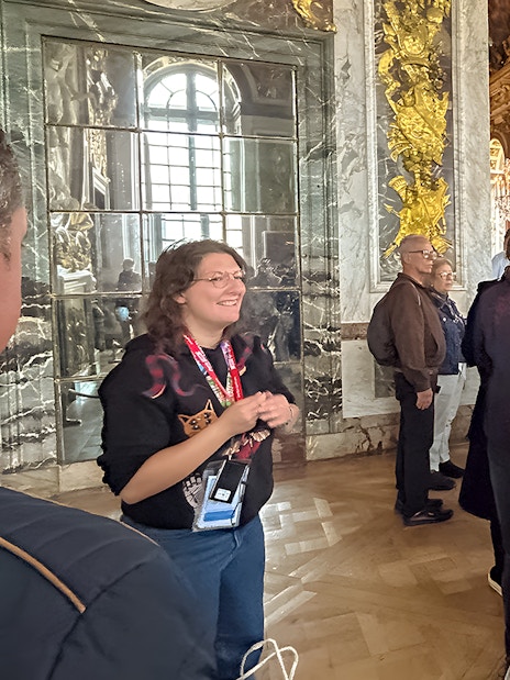 Tour group in the King's Private Apartments at Palace of Versailles, France.