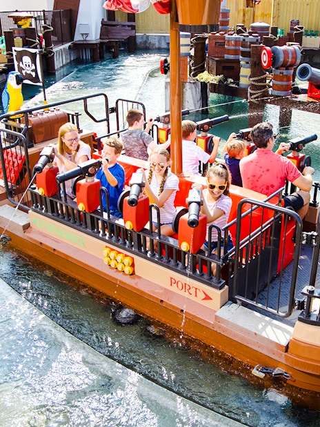 Guests enjoying a pirate-themed boat ride at Legoland New York.