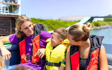 Family enjoying the Arro Jet Boat tour on the Gold Coast.