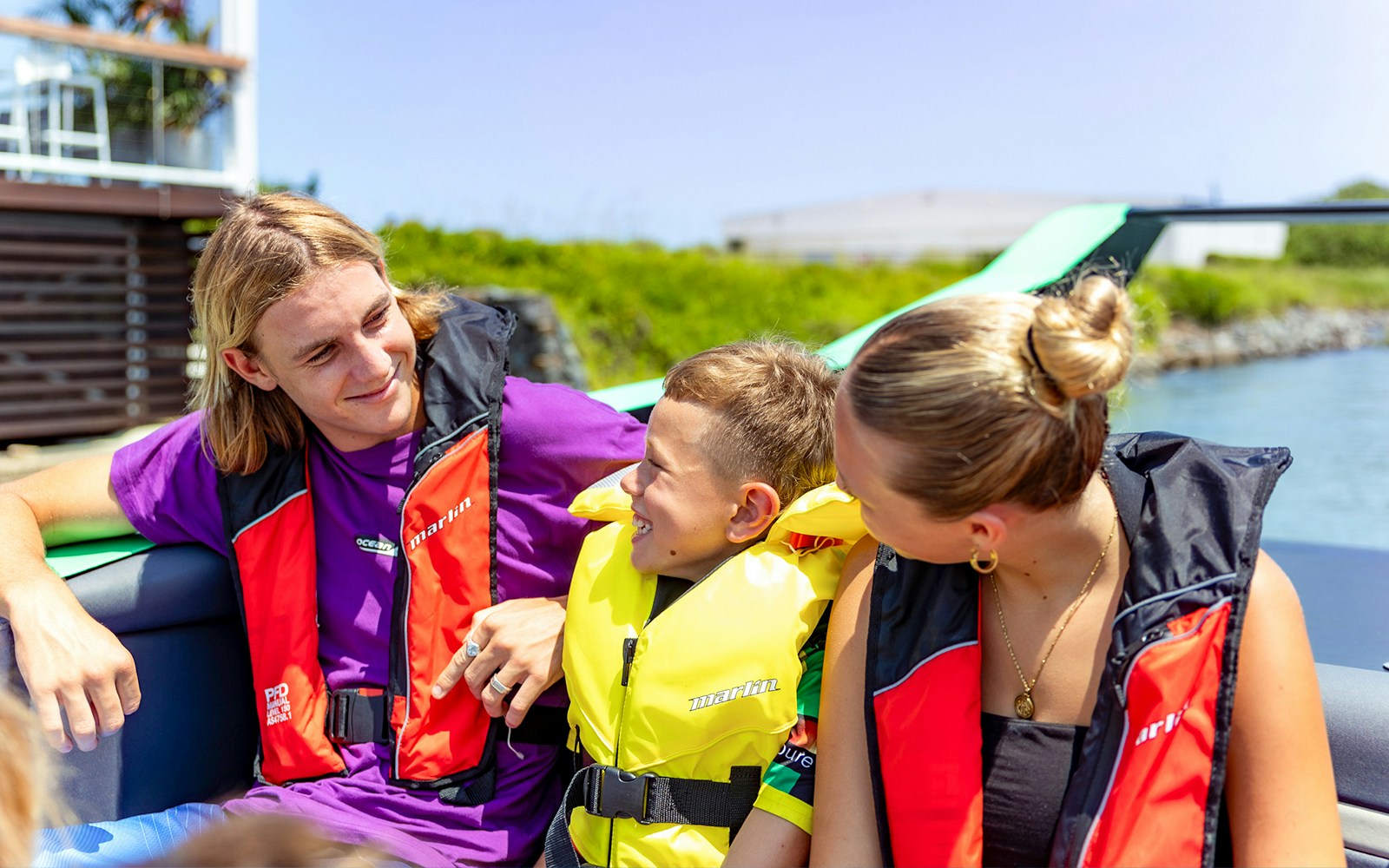Family enjoying the Arro Jet Boat tour on the Gold Coast.