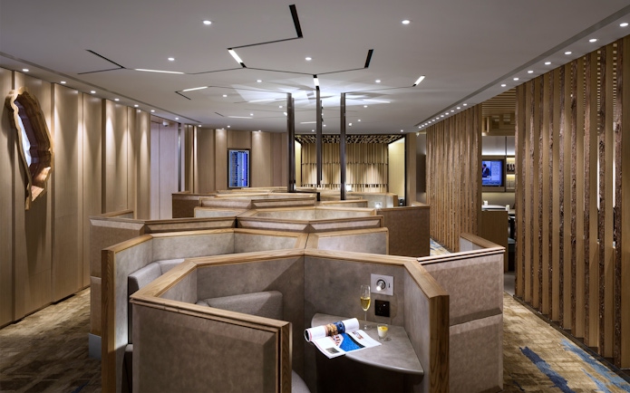 Plaza Premium Lounge seating area in ZONE D, Taipei, Taiwan with private booths.