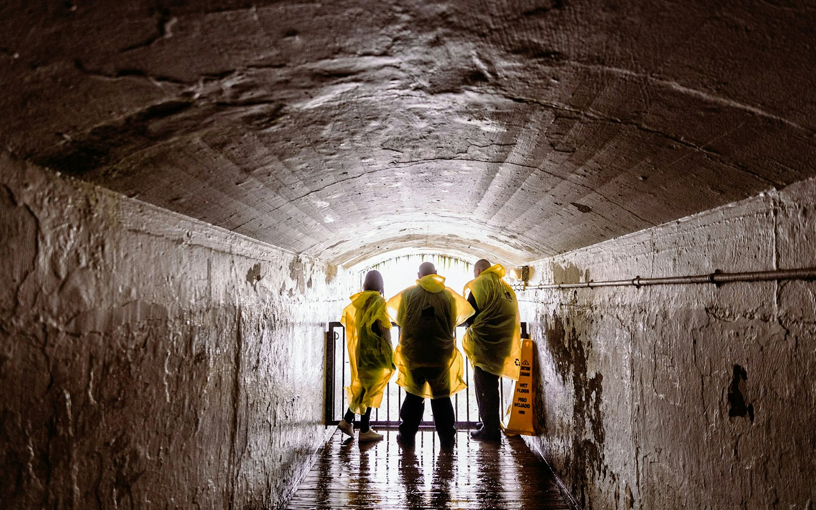 People in a tunnel at Journey Behind the Falls at Niagara Falls
