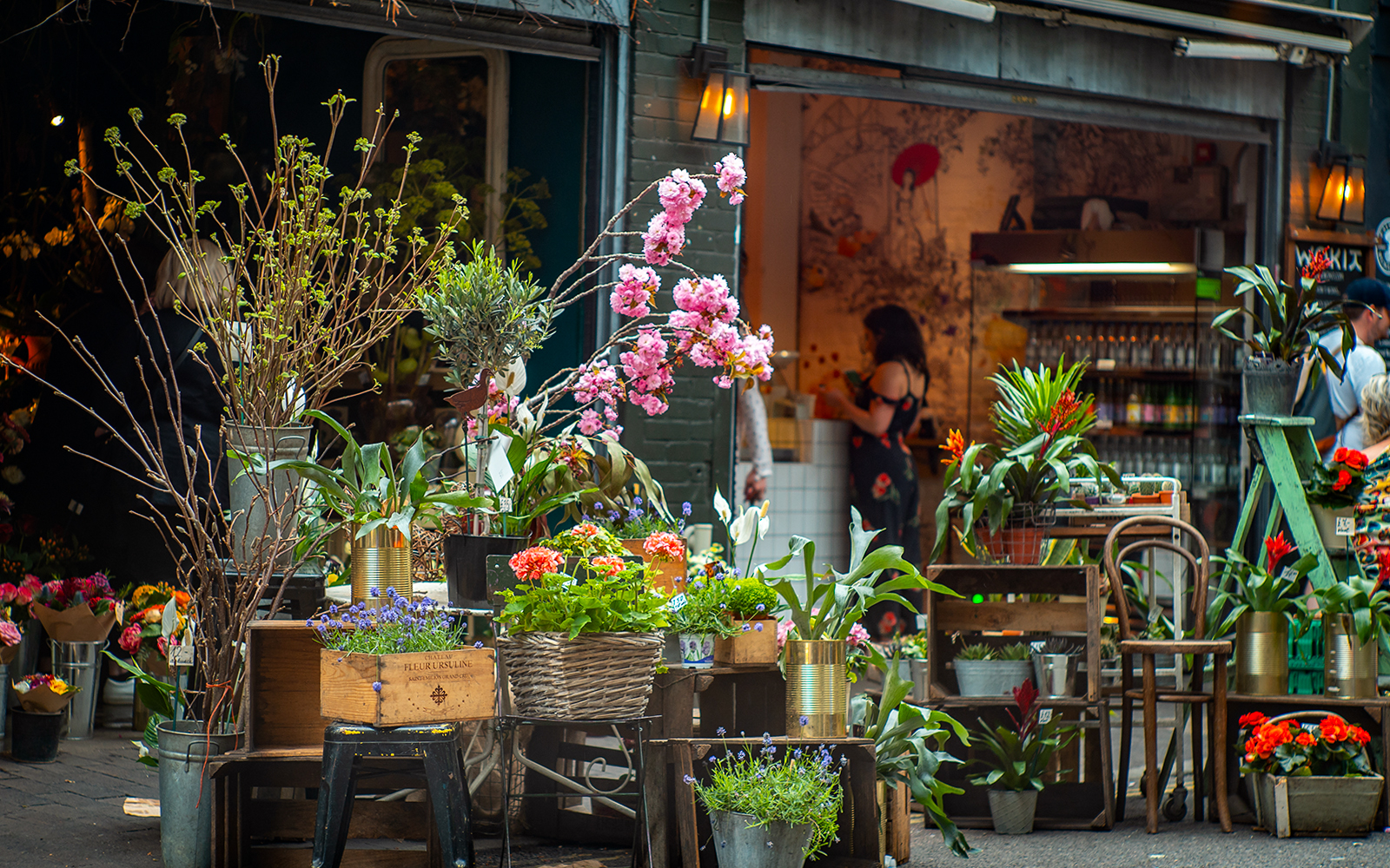 Flower stall with vibrant plants at Borough Market, London.