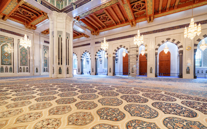 Prayer hall with intricate carpet design, Sultan Qaboos Grand Mosque, Oman.
