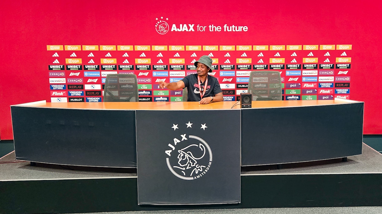 Press room at Johan Cruijff ArenA with Ajax branding, part of the Classic Tour experience.