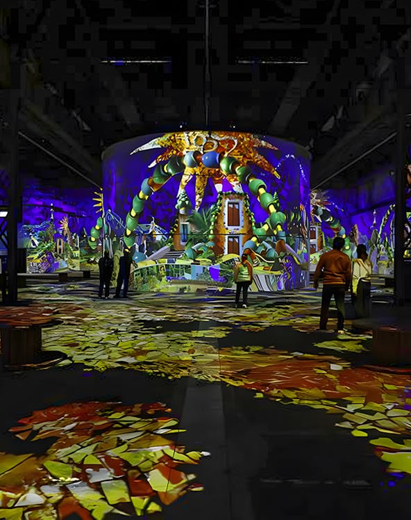 Immersive digital art display at Phoenix des Lumières with vibrant projections.