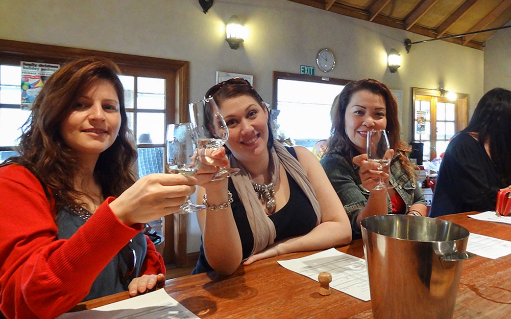 Women enjoying a wine tasting at a Hunter Valley winery.