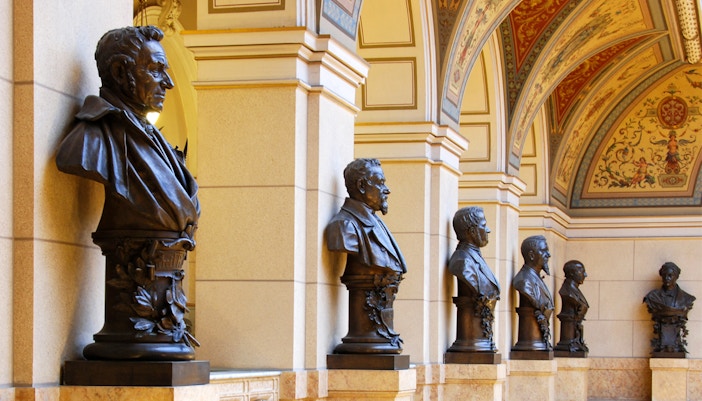 Bust sculptures in the Prague National Museum hallway, viewed with Prague CoolPass.