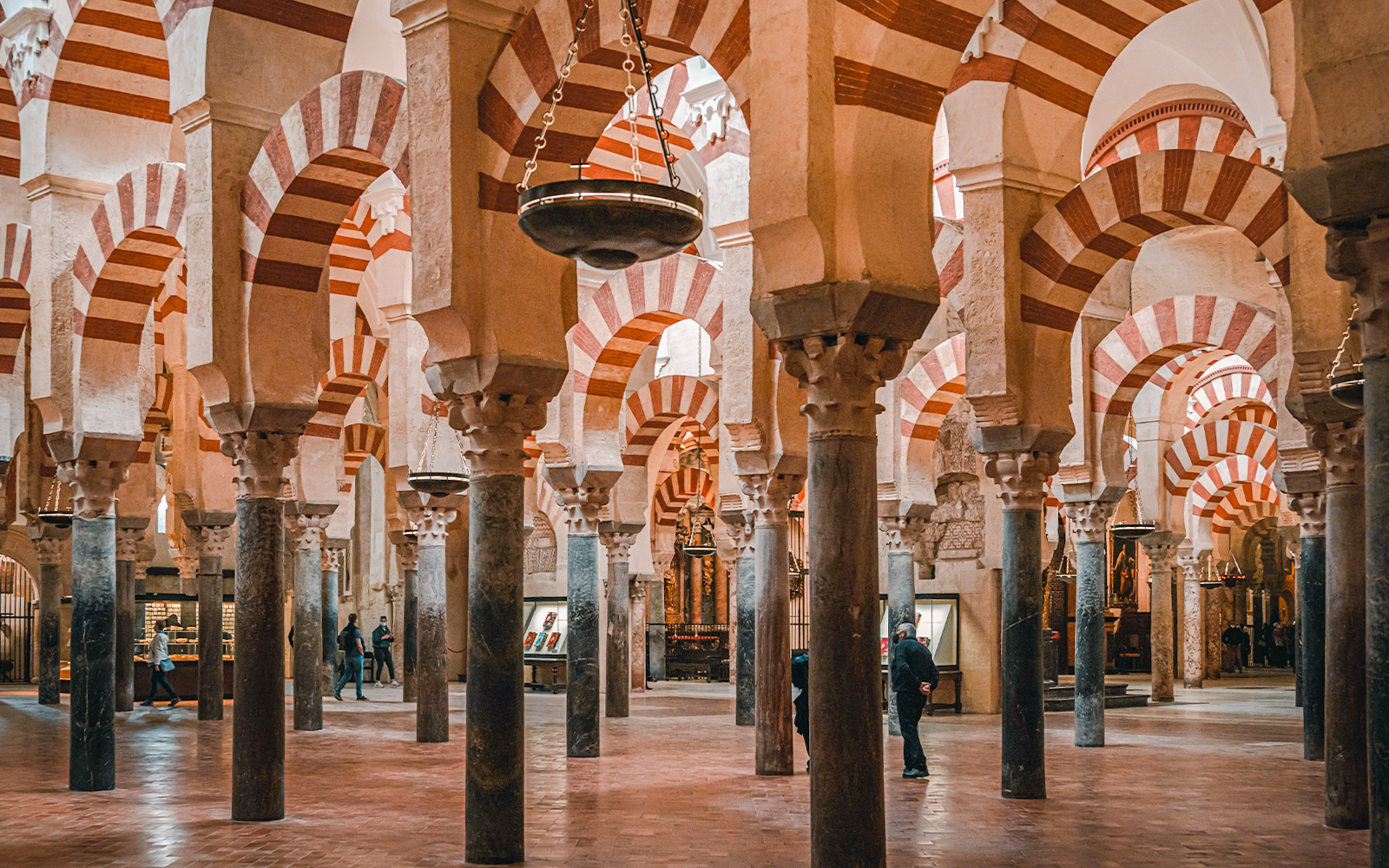 Interior arches of Cordoba Mosque-Cathedral during guided tour.