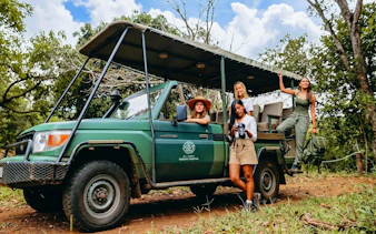 4x4 vehicle with tourists on a Bel Ombre safari in a nature reserve.