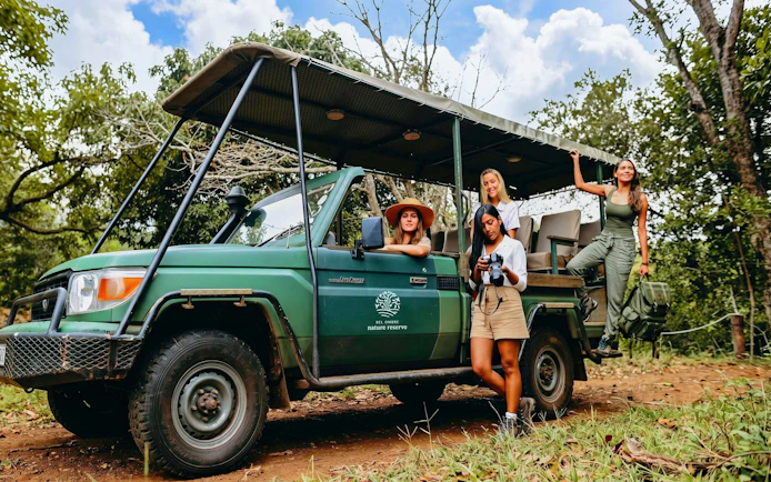 4x4 vehicle with tourists on a Bel Ombre safari in a nature reserve.