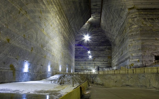Slanic Salt Mine interior with illuminated walls, Bucharest tour.