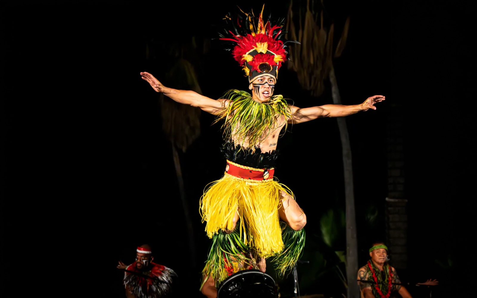 Performer in traditional attire at Chief's Luau, Oahu, Hawaii.