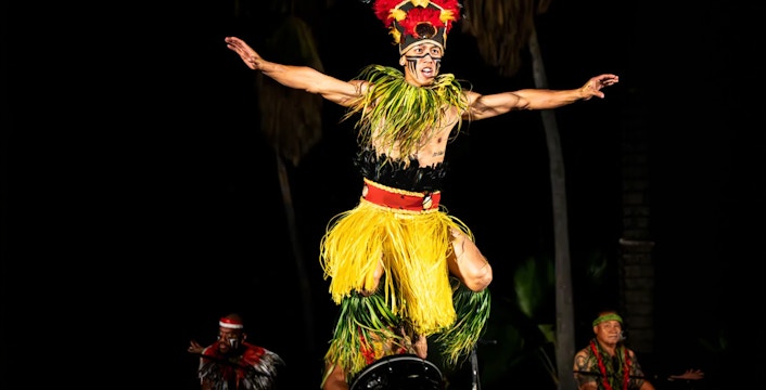Performer in traditional attire at Chief's Luau, Oahu, Hawaii.