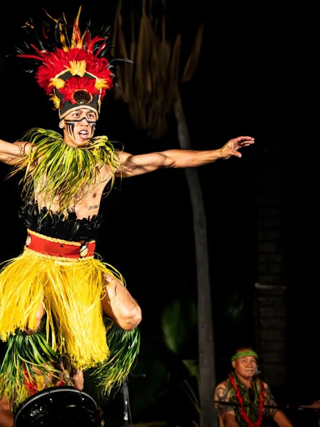 Performer in traditional attire at Chief's Luau, Oahu, Hawaii.