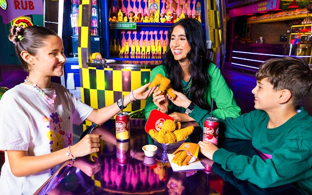 Dubai House of Hype interior with vibrant lights and modern decor, showcasing the immersive experience of House of Hype Tickets.