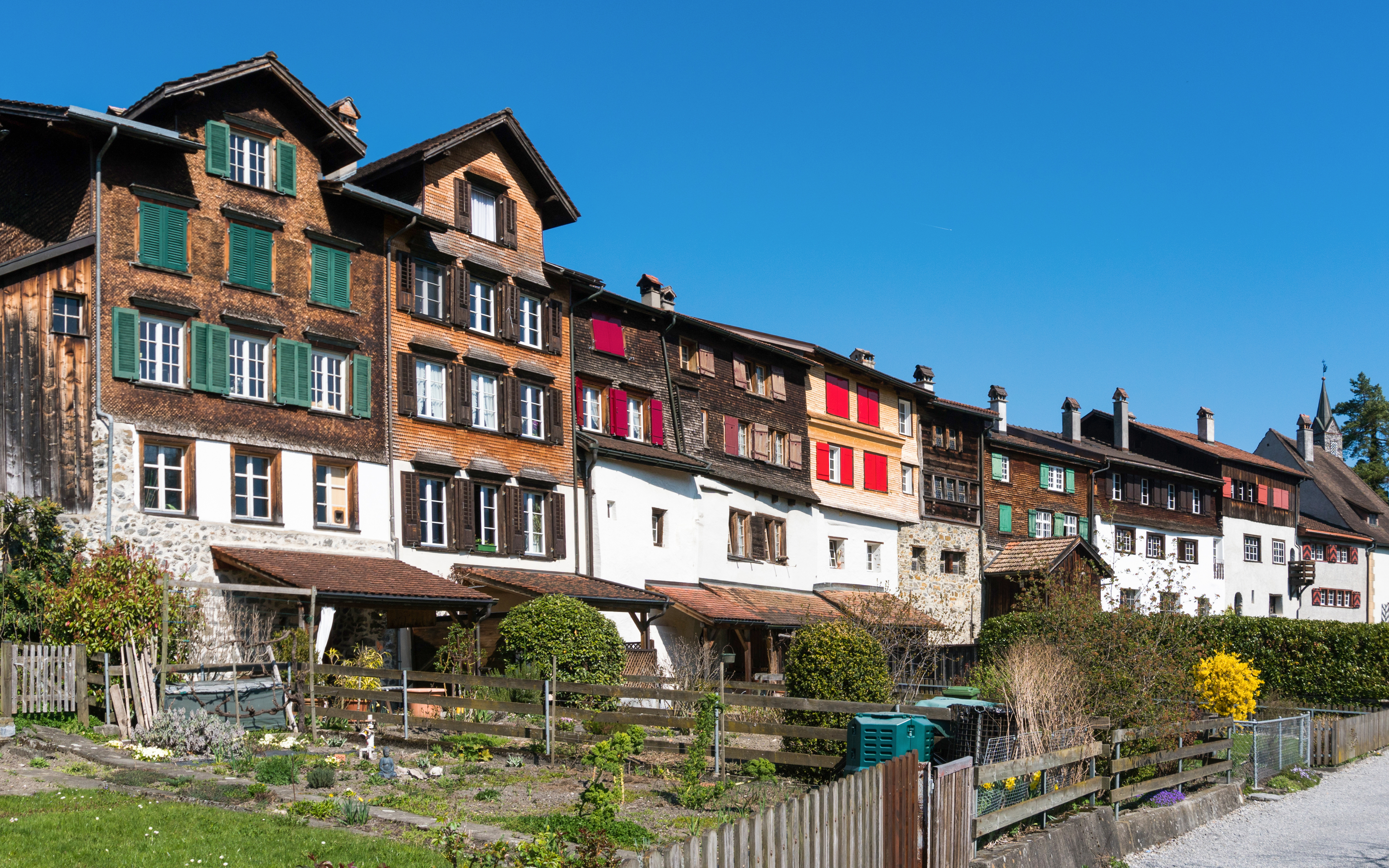 Werdenberg village with traditional Burgher homes featuring wall art and paintings.