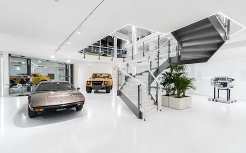 Lamborghini cars and engine display at Automobili Lamborghini Museum, Sant'Agata Bolognese, Italy.