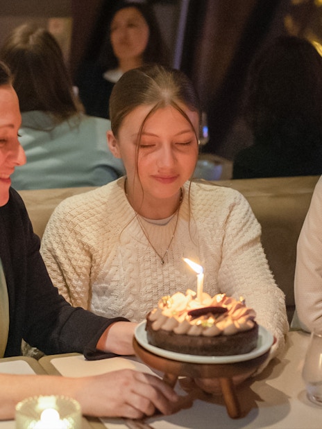 Guests enjoying a birthday celebration at Madame Brasserie, Eiffel Tower.