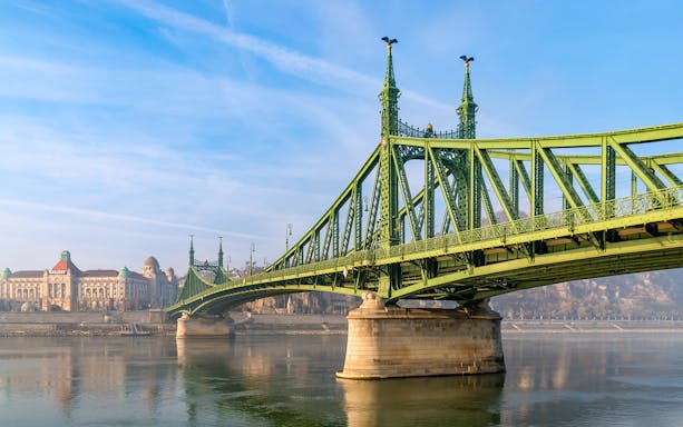 Liberty Bridge spanning the Danube River in Budapest, connecting Buda and Pest.