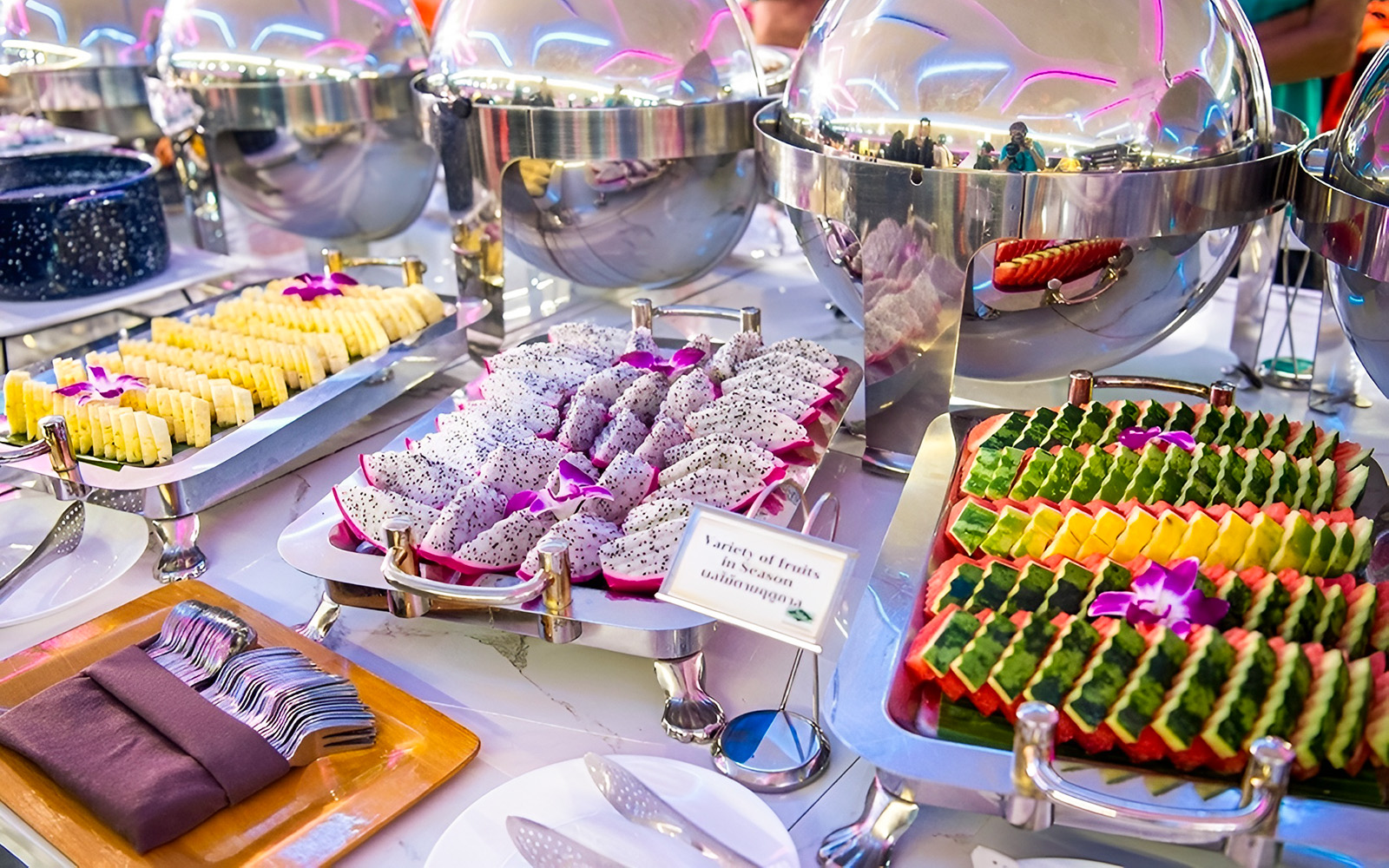Variety of fresh fruits on display at Smile Riverside Dinner Cruise buffet.