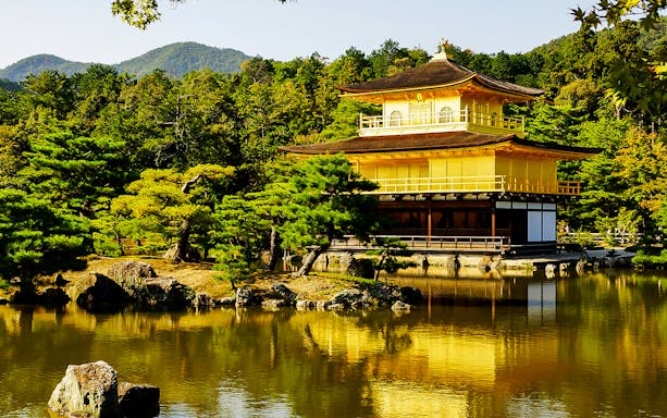 Kinkaku-ji Temple reflecting in a pond during a guided day tour of Kyoto and Nara.