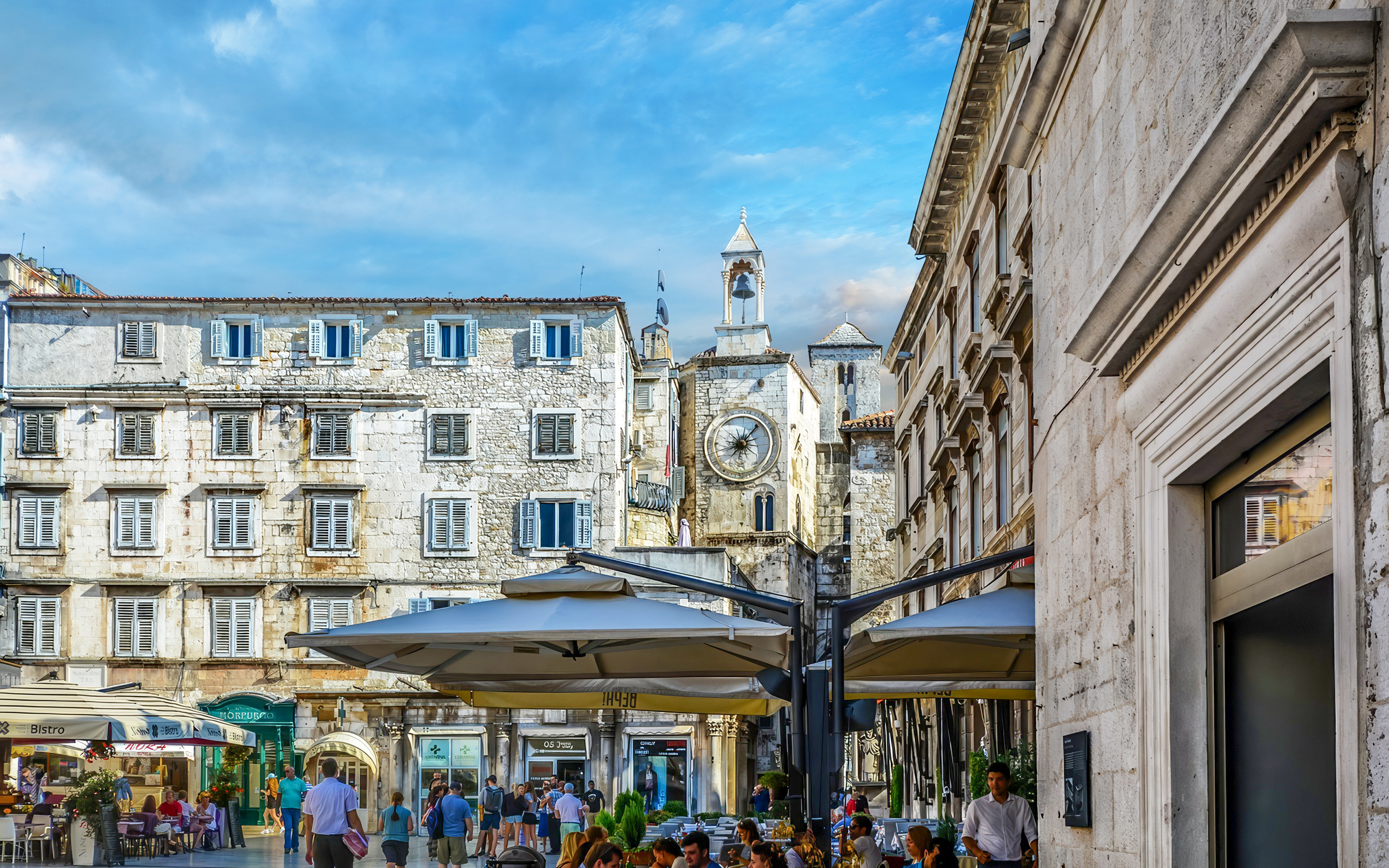 People's Square in Split, Croatia, featuring historic buildings and a clock tower.