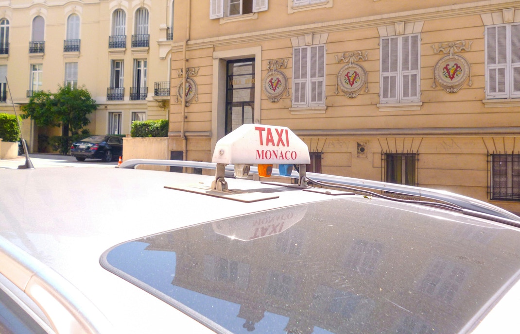 Monaco taxi near Oceanographic Museum building.