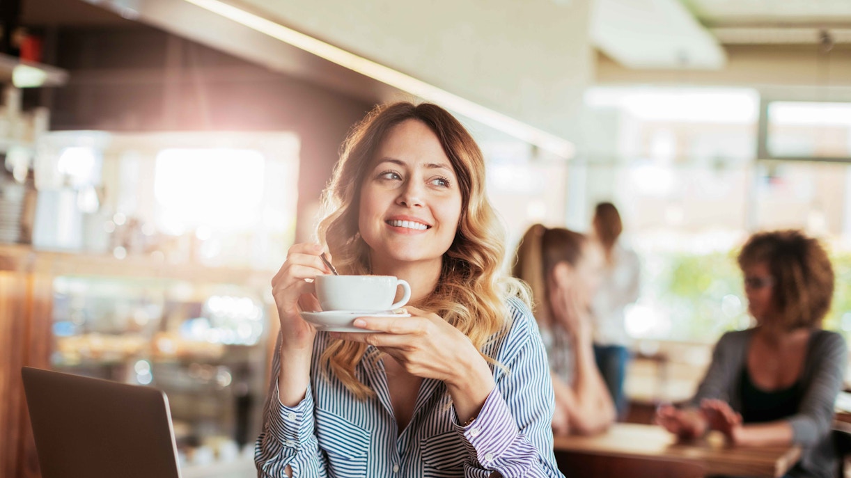 girl sitting inside a restaurant