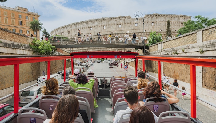 City Sightseeing bus in Rome near the Colosseum.