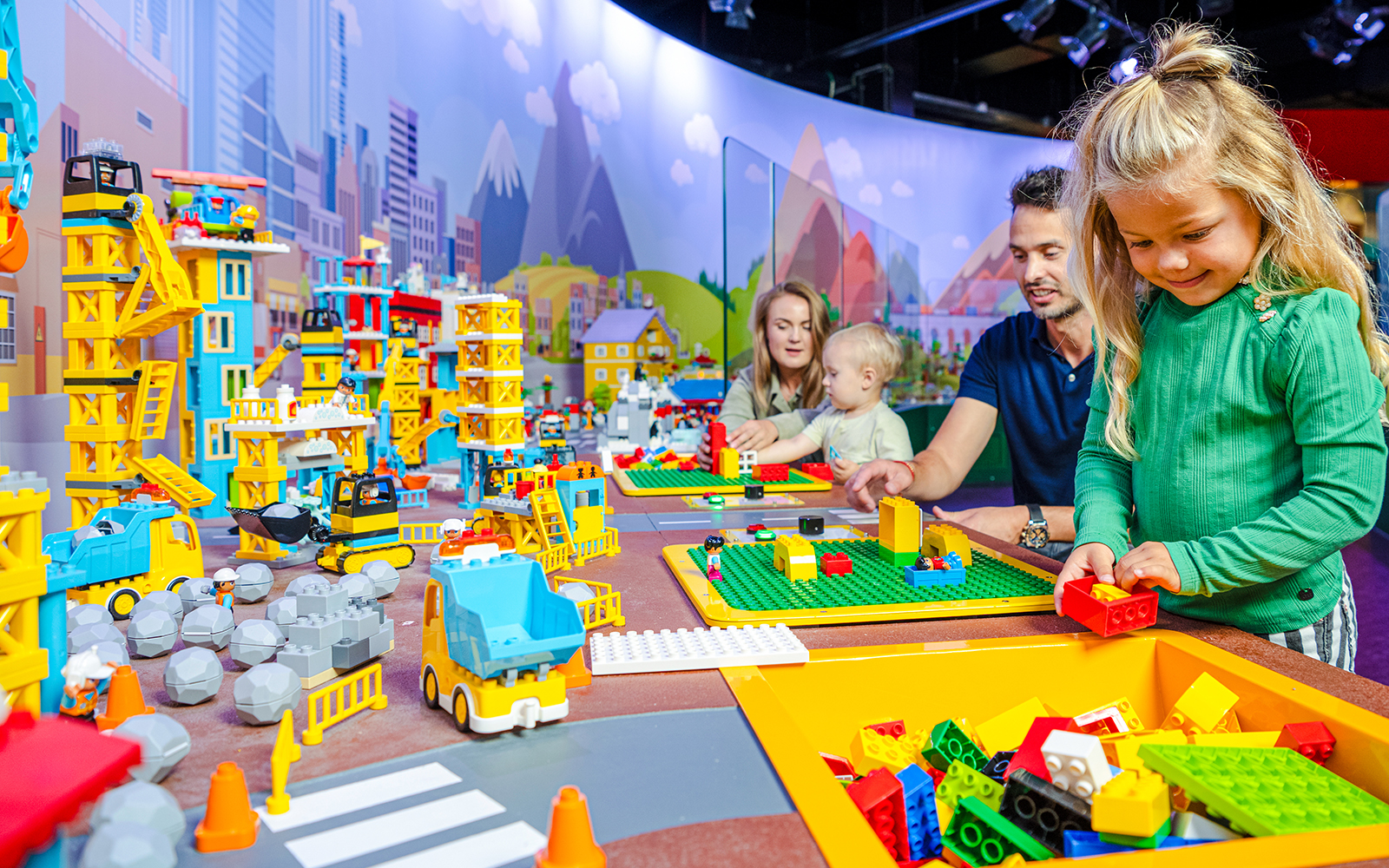 Kids building with LEGO bricks at LEGO Discovery Center Boston.