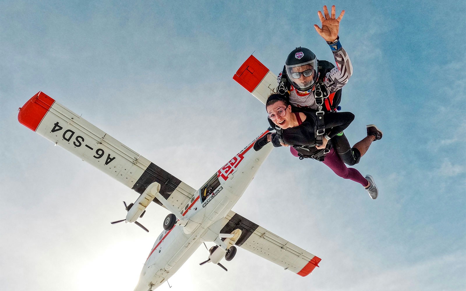 Tourist jumping from plane for Sky Diving