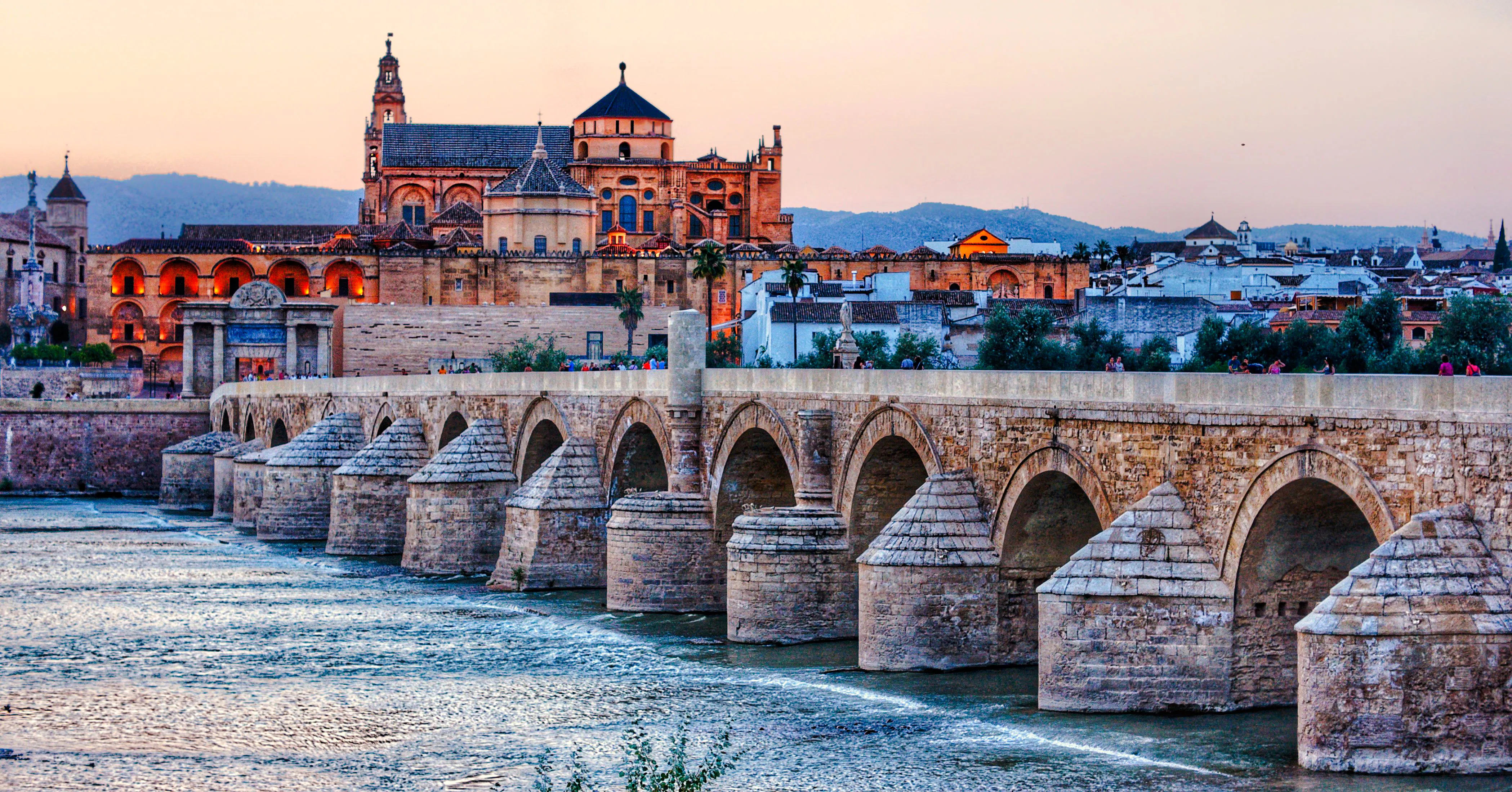 Roman Bridge and Mosque-Cathedral during Córdoba walking tour, Spain.