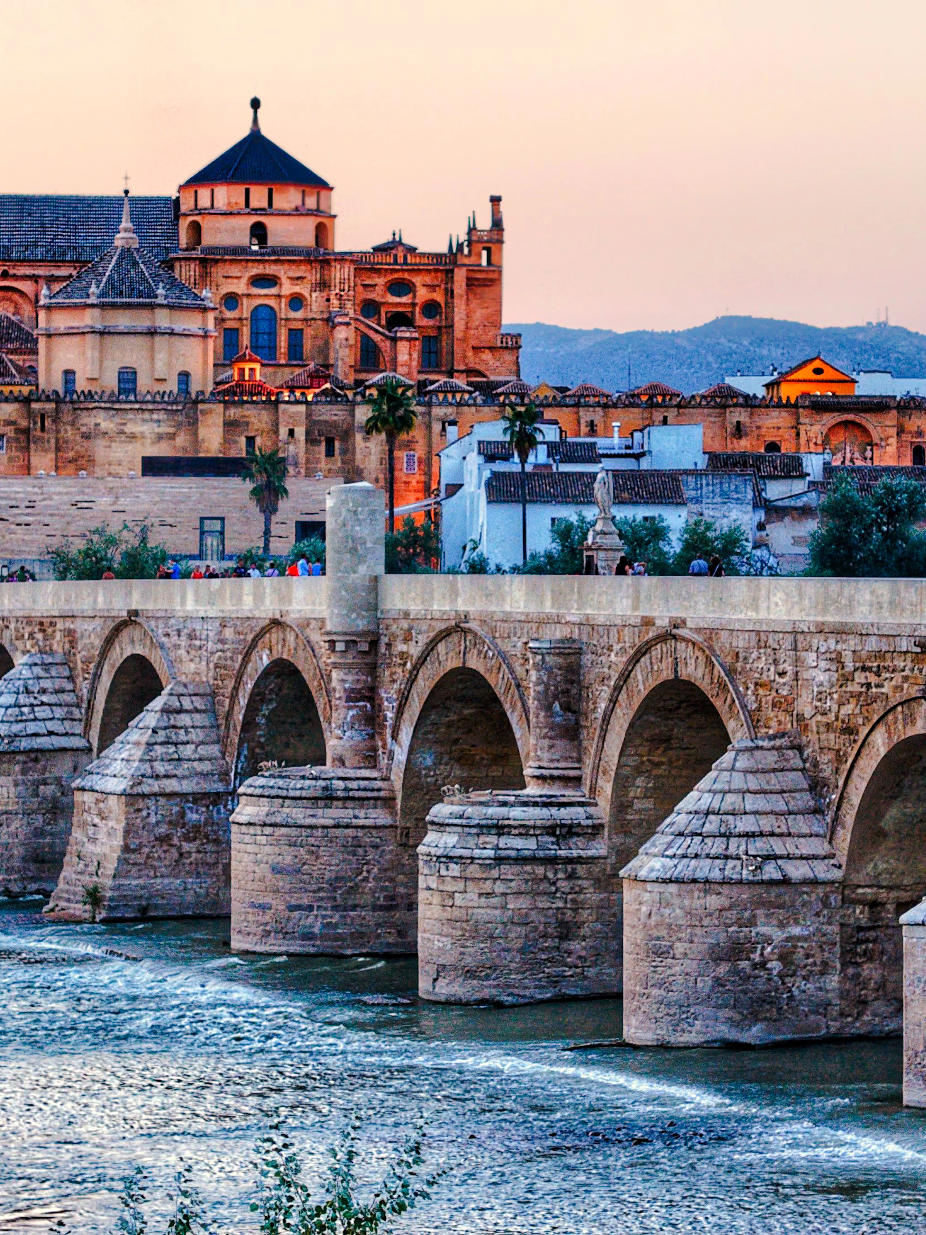 Roman Bridge and Mosque-Cathedral during Córdoba walking tour, Spain.