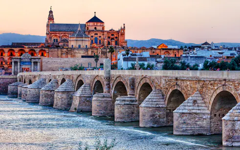 Roman Bridge and Mosque-Cathedral during Córdoba walking tour, Spain.